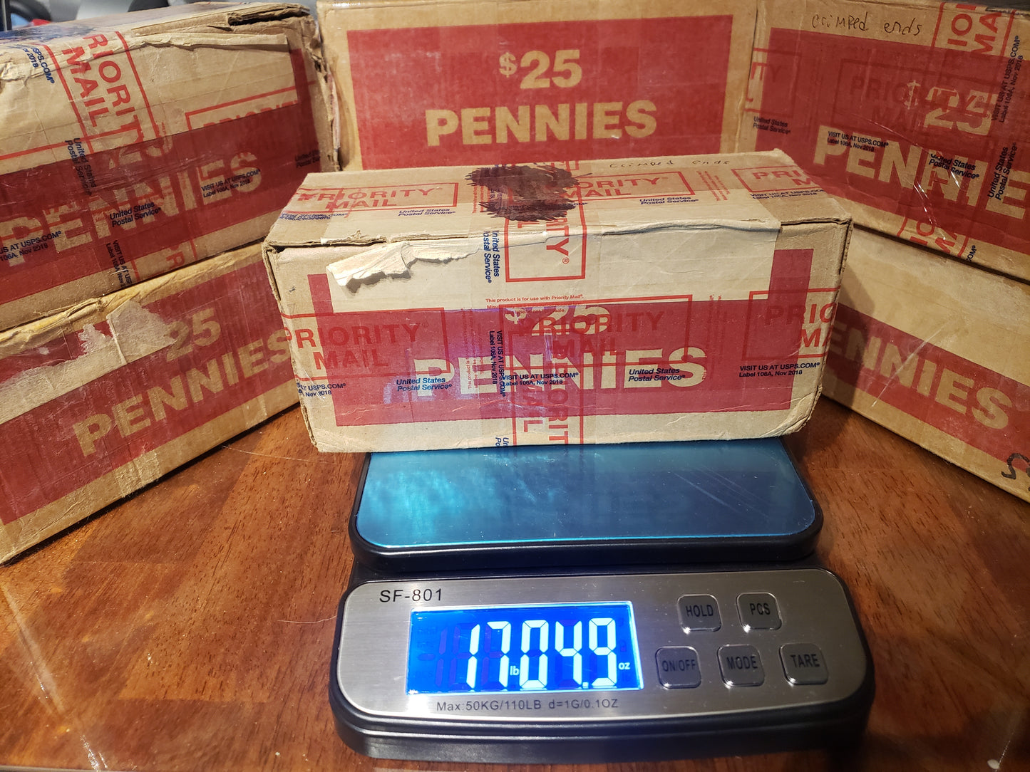 Box of 95% Copper Pennies on a Scale